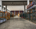 Drive-through machinery shed