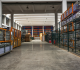 Drive-through machinery shed